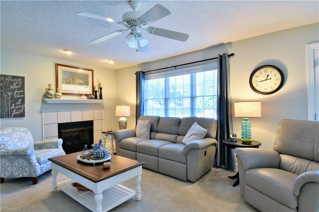 111 Montclair Drive Advance, NC 27006 - Photo 20 of 44 Den has fireplace, new gas logs with remote