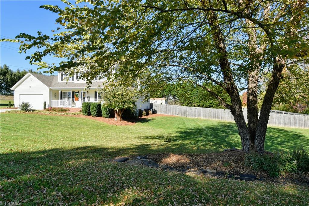 111 Montclair Drive Advance, NC 27006 - Photo 3 of 44 Lovely landscaped yard