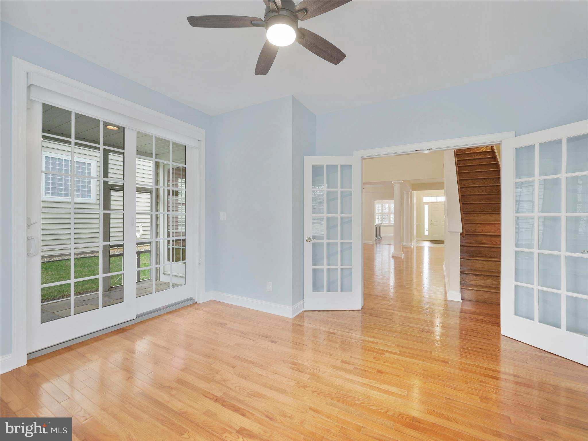 6881 Old Course Road Fayetteville, PA 17222 - Photo 17 of 40 a view of empty room with wooden floor and fan