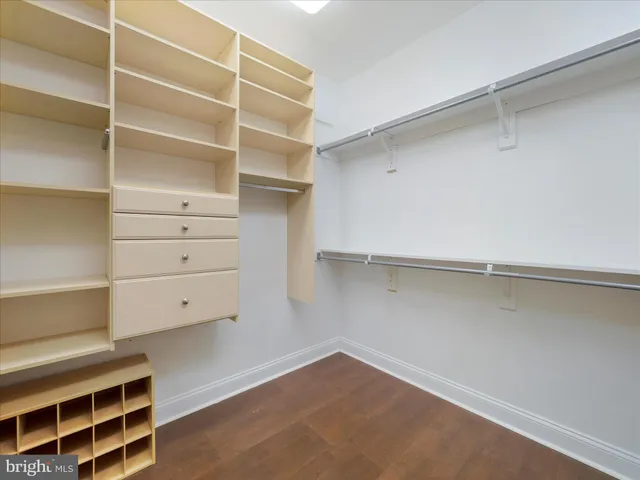 a view of an empty walk in closet