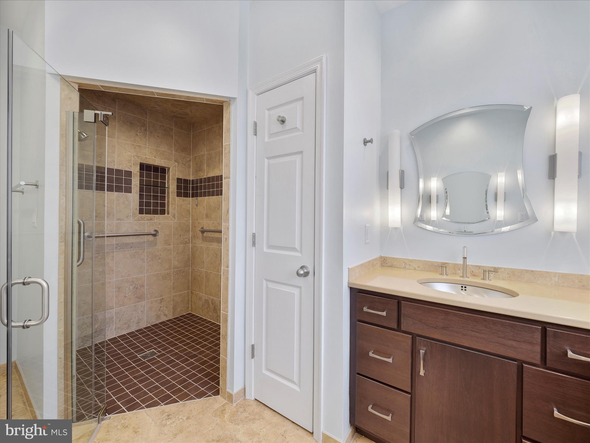 6881 Old Course Road Fayetteville, PA 17222 - Photo 23 of 40 a bathroom with a granite countertop sink mirror and shower