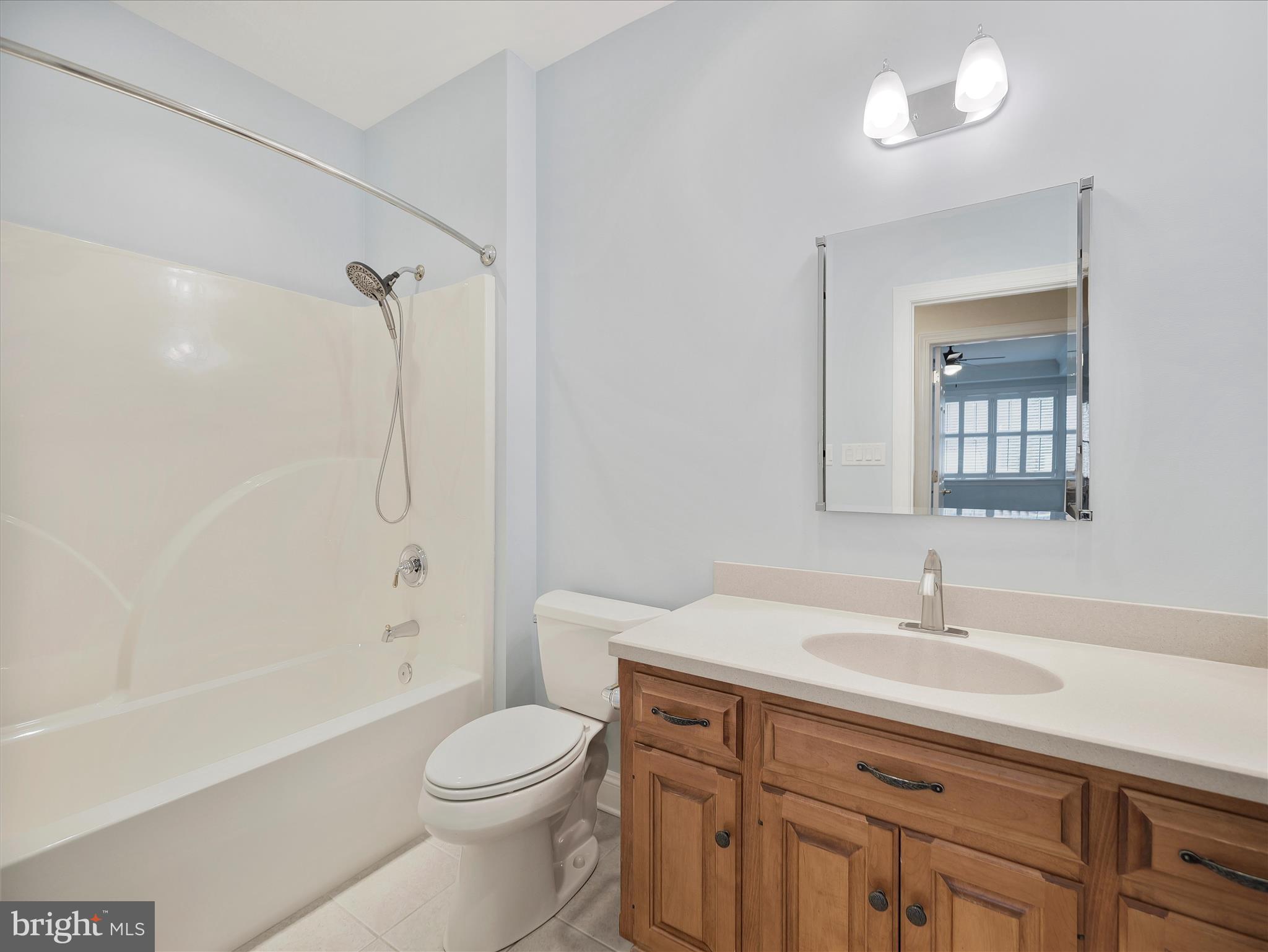 6881 Old Course Road Fayetteville, PA 17222 - Photo 26 of 40 a bathroom with a sink a toilet and shower
