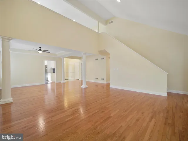 a view of a livingroom with wooden floor