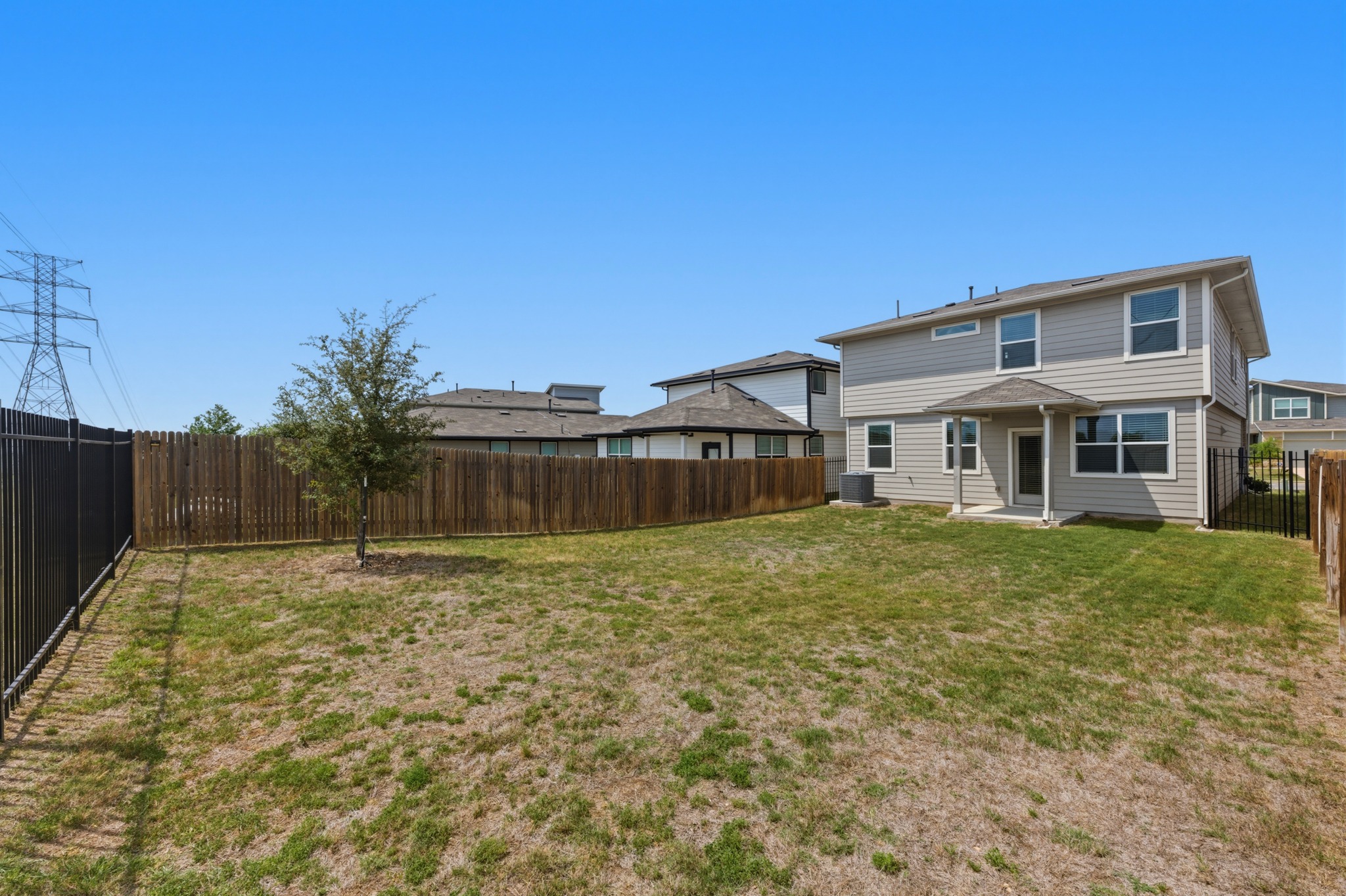 7511 Traylor Cove Austin, TX 78724 - Photo 29 of 40 a front view of a house with a yard