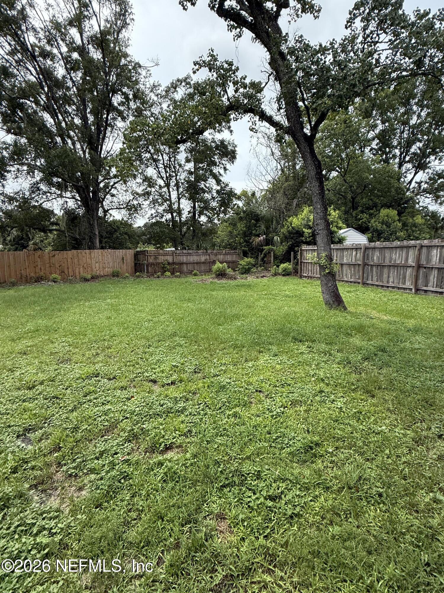 3930 Cobalt Avenue East Jacksonville, FL 32210 - Photo 39 of 44 View to Back Yard from Porch