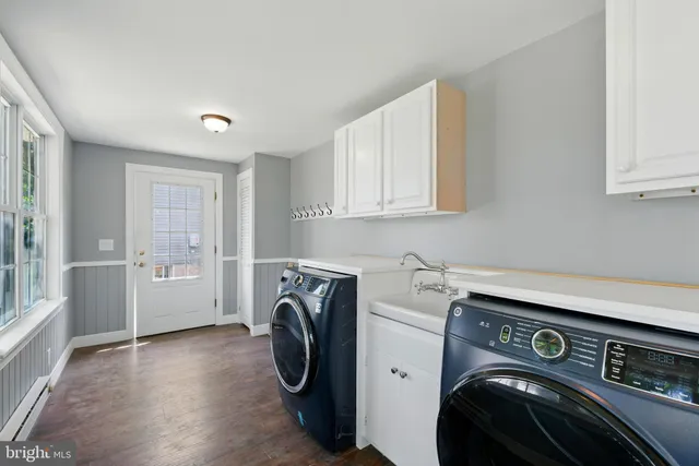 a utility room with dryer and washer