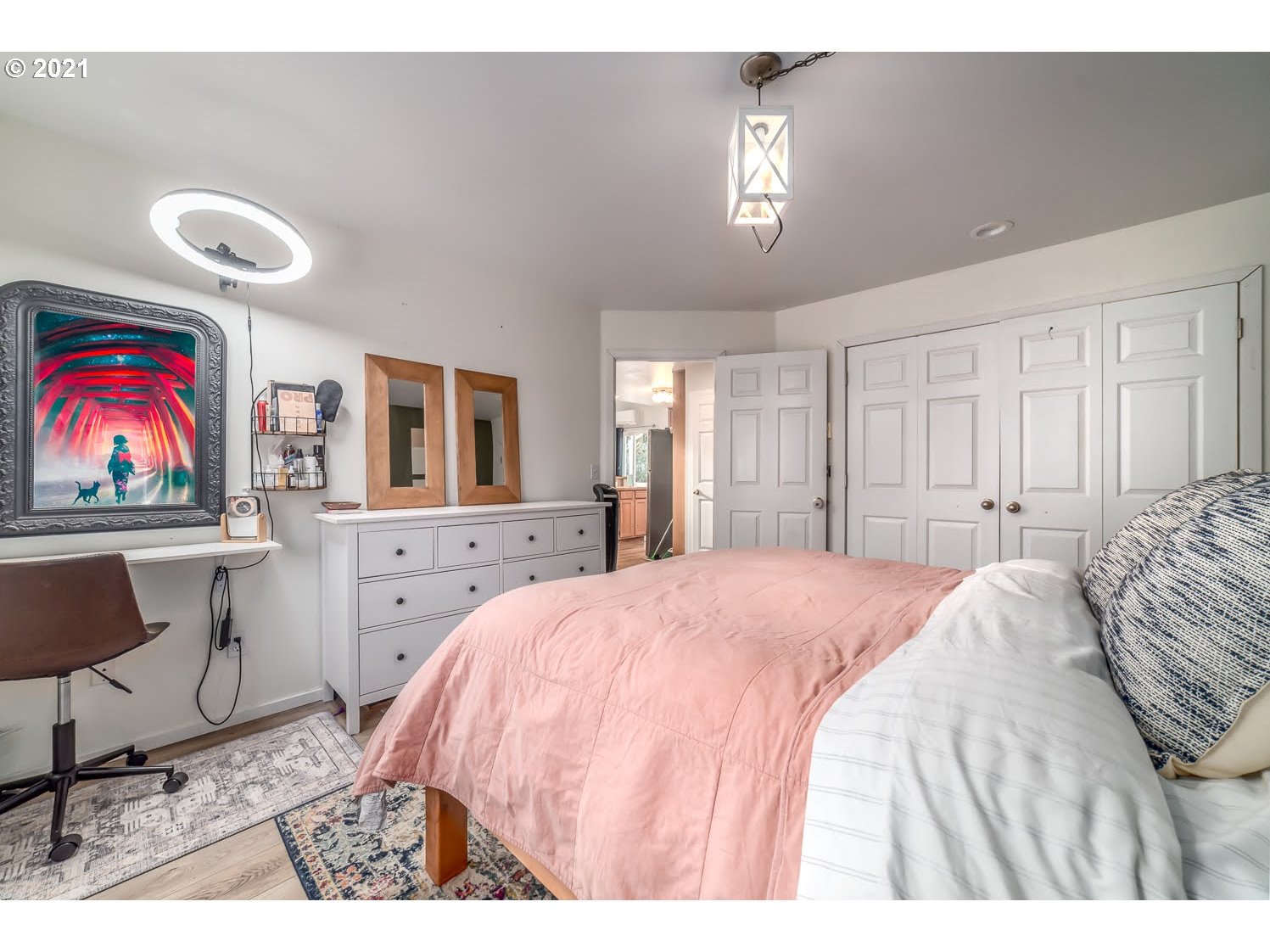 238 South 68th Court Springfield, OR 97478 - Photo 18 of 31 a spacious bedroom with a bed a dresser next to a window