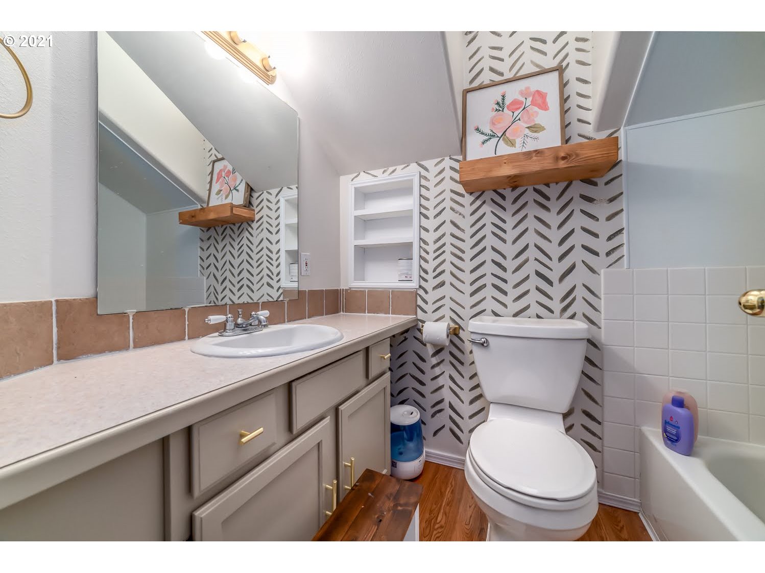 238 South 68th Court Springfield, OR 97478 - Photo 20 of 31 a bathroom with a sink toilet and mirror