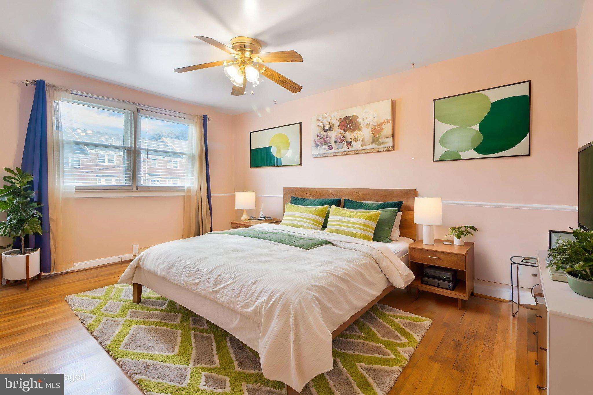 1903 Heathfield Road Baltimore, MD 21239 - Photo 13 of 30 a bedroom with a bed and a chandelier