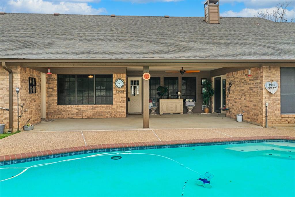 5840 Crystal Drive Midlothian, TX 76065 - Photo 29 of 36 front view of a building with a garden