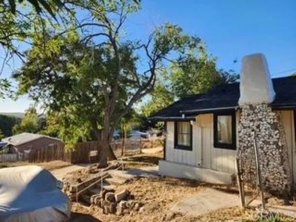 a bathroom with a shower and toilet