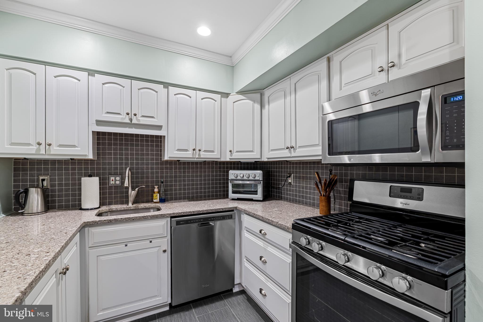 1 Cross Keys Road, Unit 1A Baltimore, MD 21210 - Photo 14 of 52 No maintenance quartz counters and gas cooking.