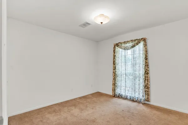 a bathroom with a sink toilet and vanity