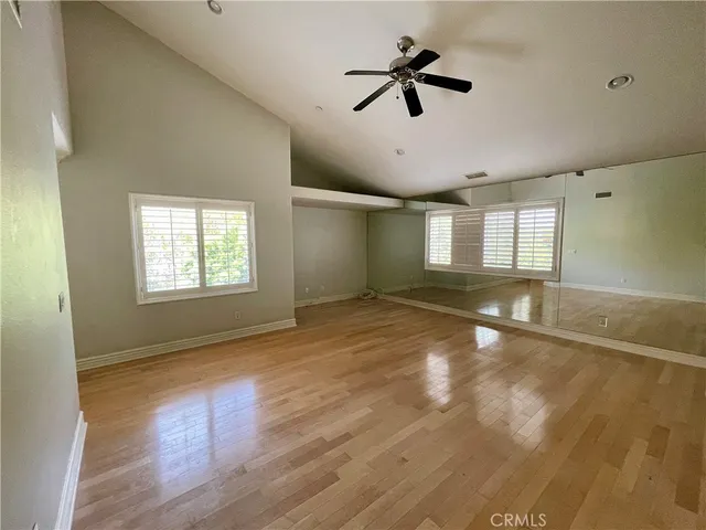 a view of a hallway with windows