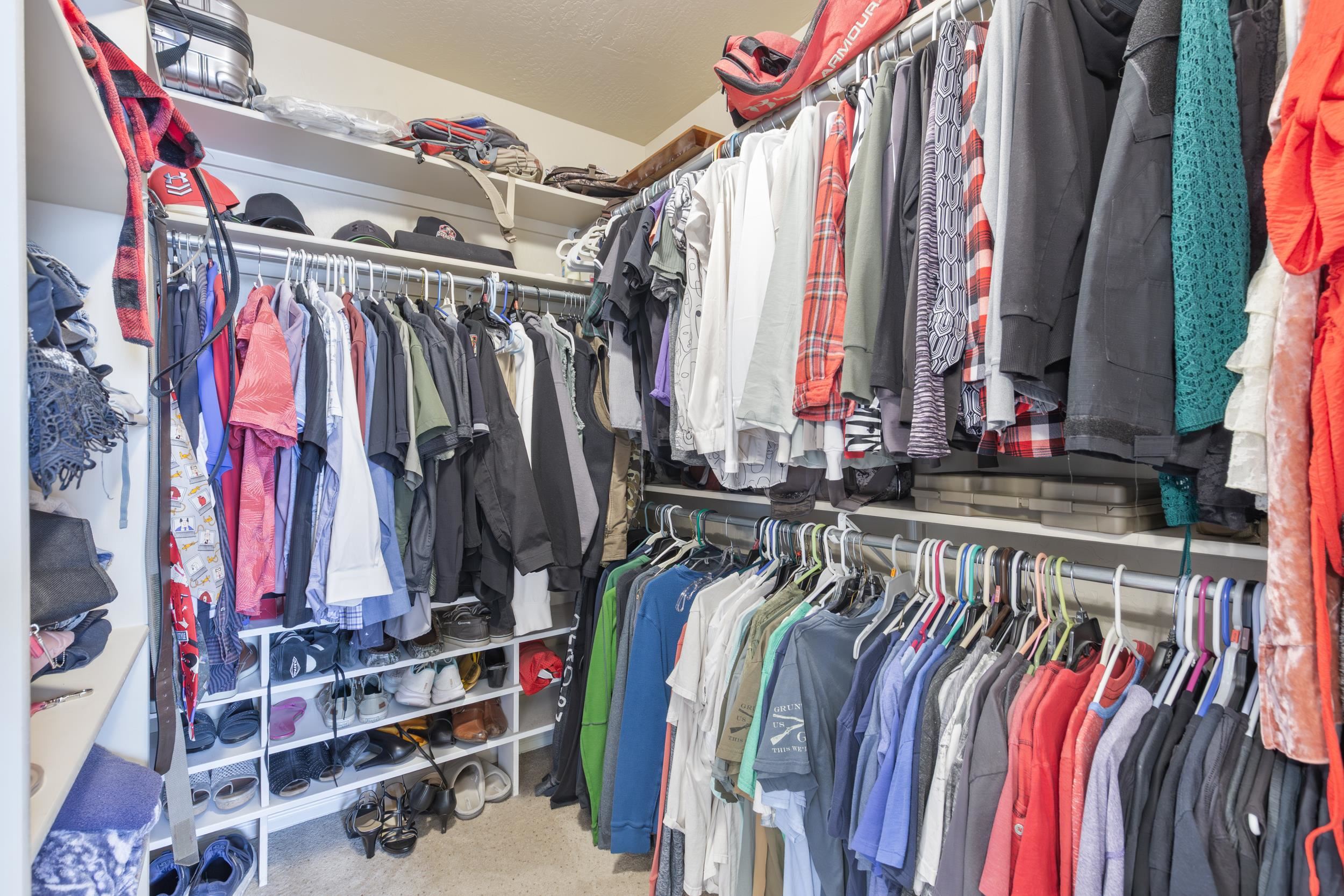 544 Hemlock Drive Fruita, CO 81521 - Photo 23 of 36 a view of walk in closet with clothes and shoes