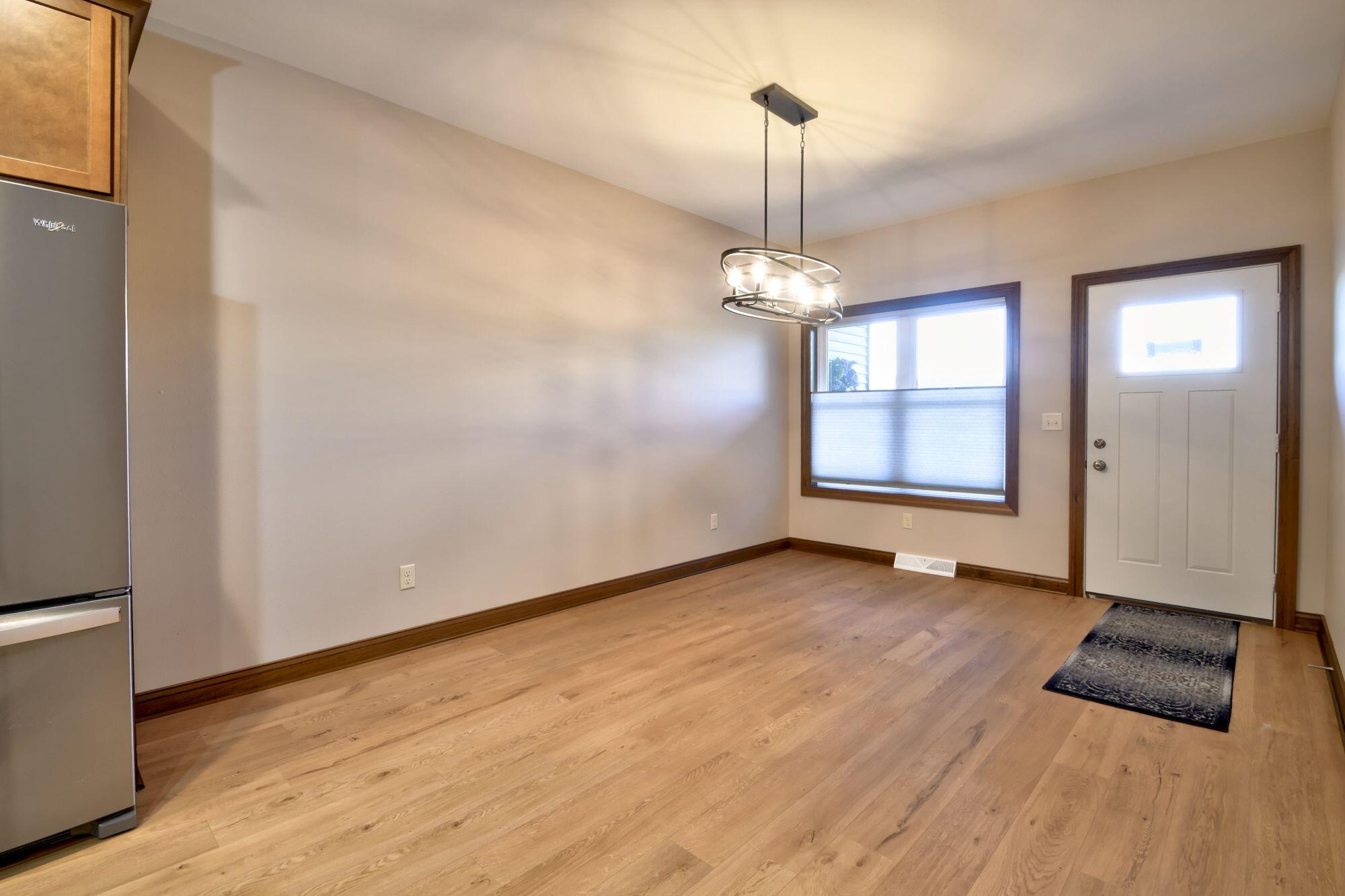 1791 Edgewood Road, Unit 11 Kewaskum, WI 53040 - Photo 6 of 16 1791 Dining area
