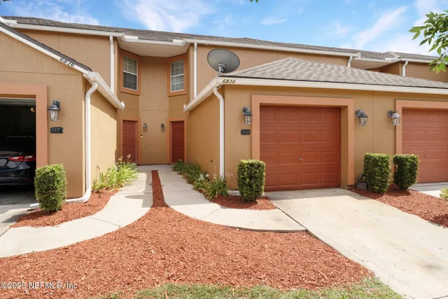 a view of a house with a patio