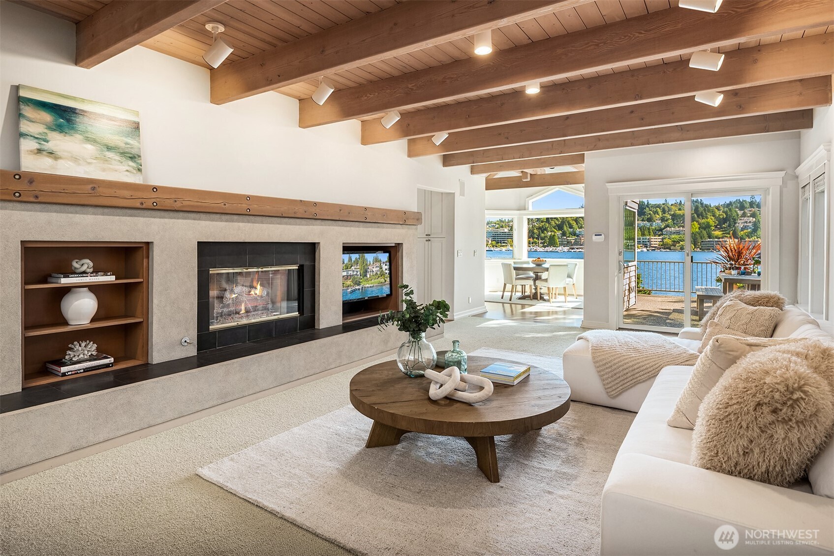 4640 95th Avenue Northeast Yarrow Point, WA 98004 - Photo 13 of 32 a living room with furniture and a fireplace