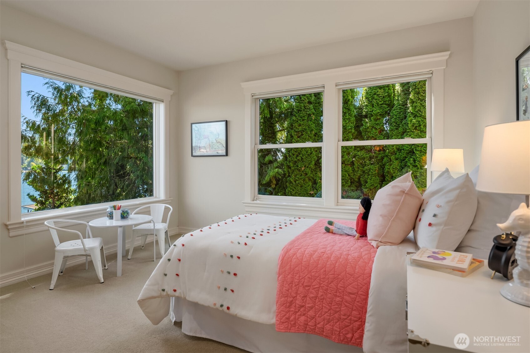 4640 95th Avenue Northeast Yarrow Point, WA 98004 - Photo 21 of 32 a bedroom with a bed and large windows