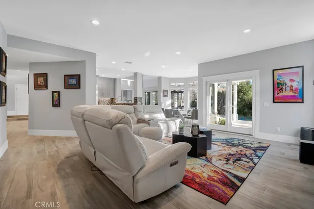 a view of walk in closet with clothes
