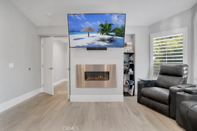 a work room with furniture and a window