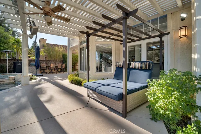 a view of a roof deck with couches