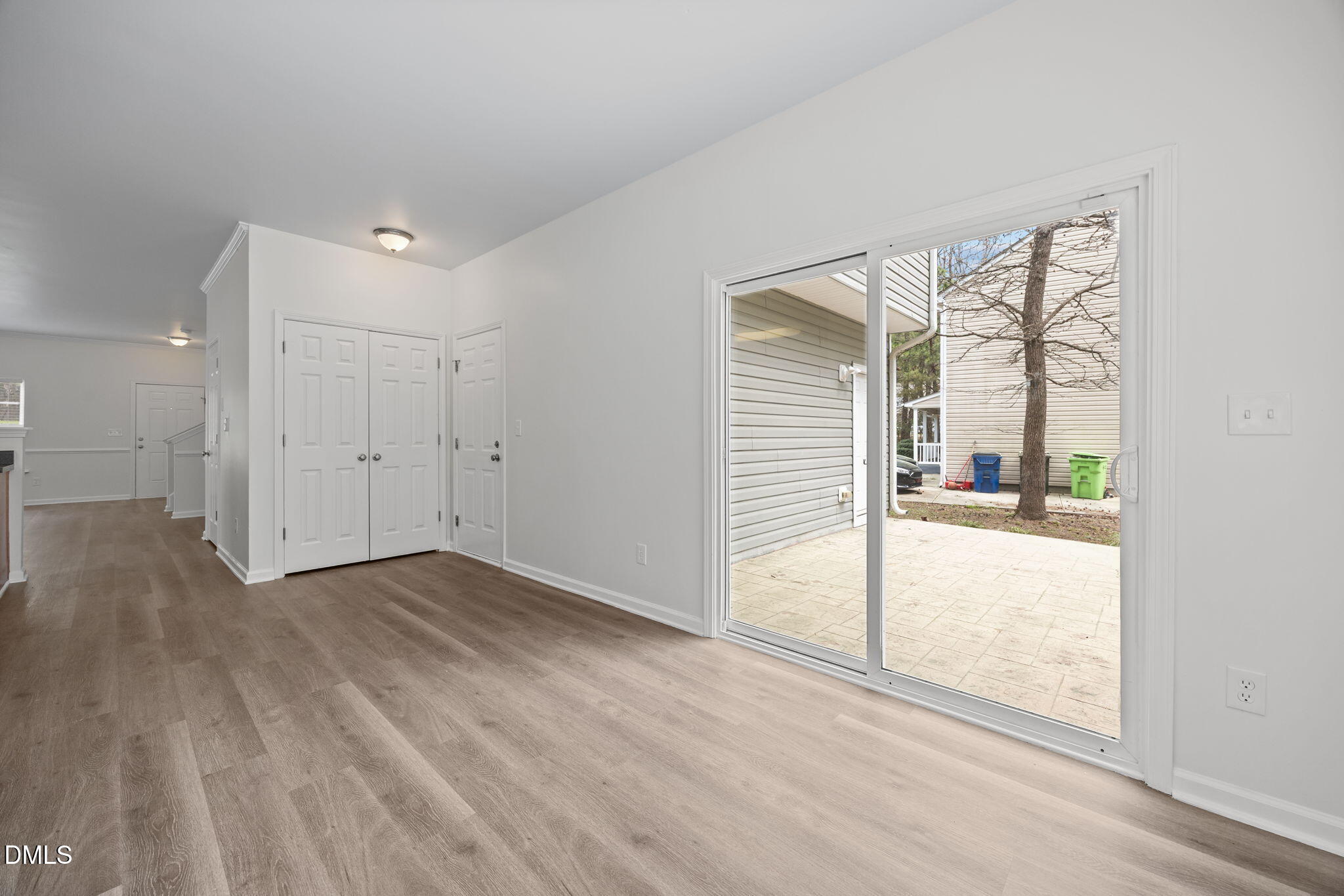 1071 Heritage Manor Drive Raleigh, NC 27610 - Photo 14 of 42 an empty room with wooden floor and windows