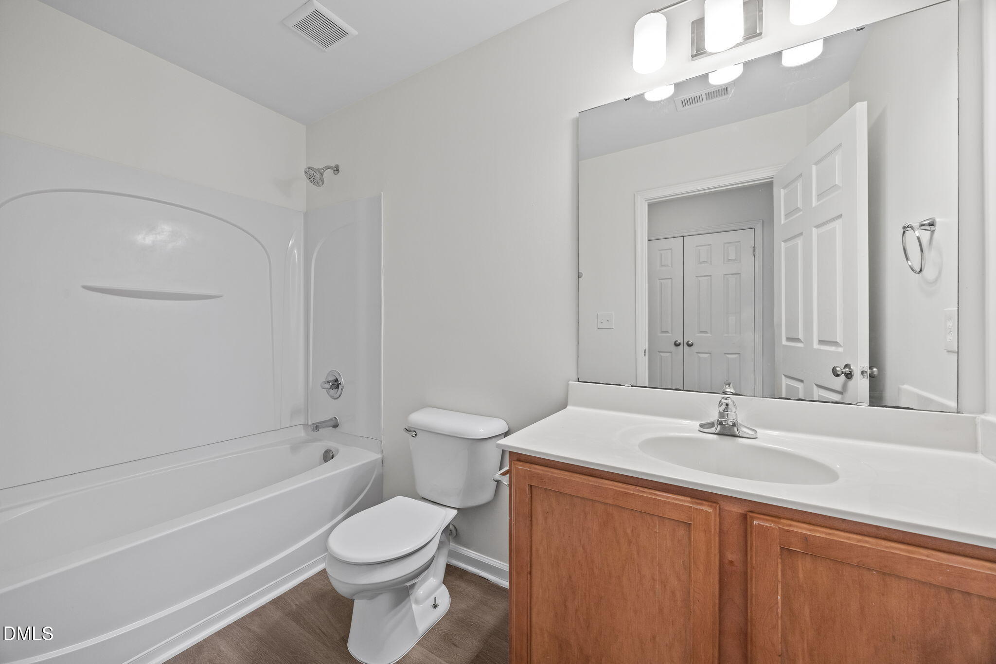 1071 Heritage Manor Drive Raleigh, NC 27610 - Photo 25 of 42 a bathroom with a sink toilet tub and shower