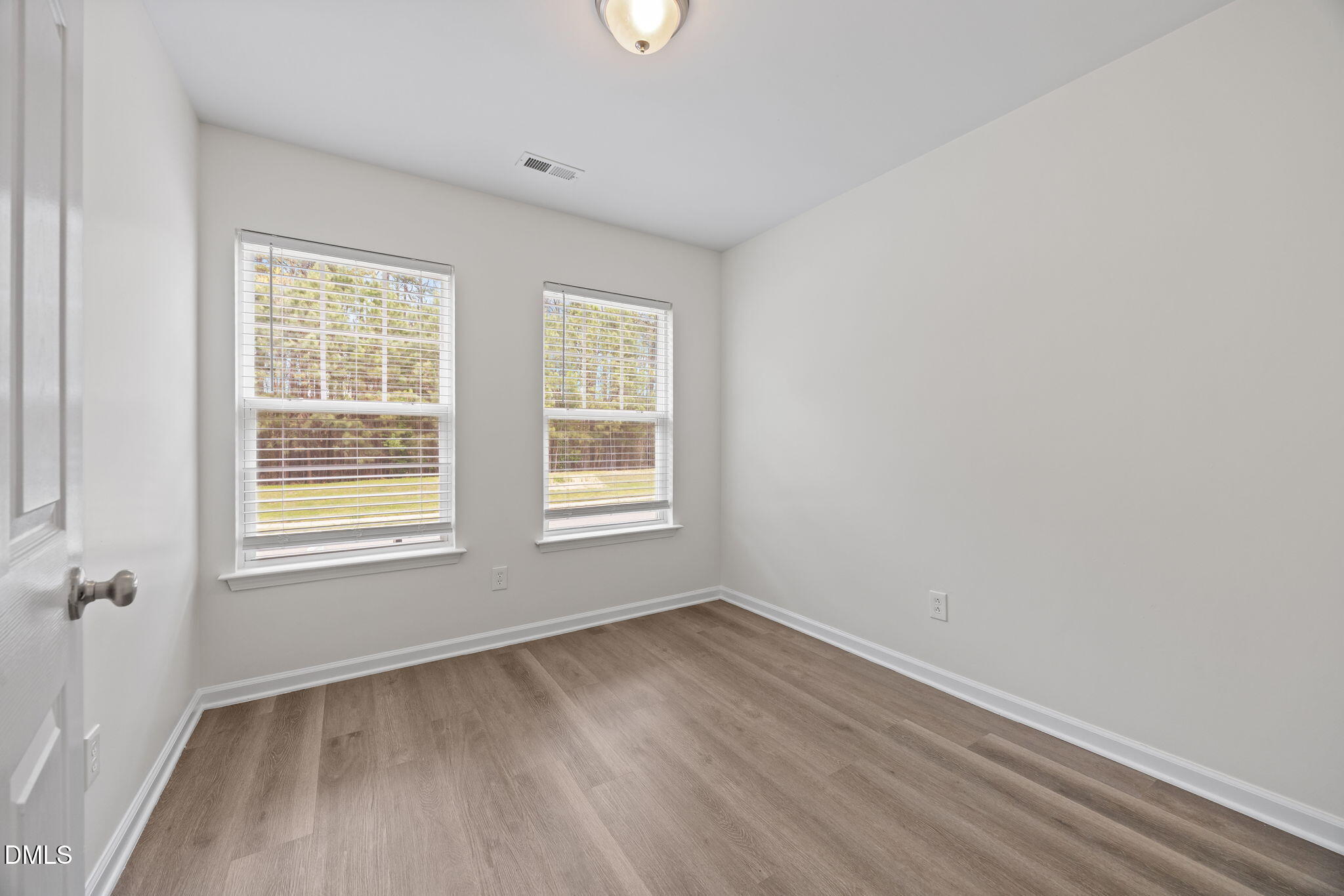 1071 Heritage Manor Drive Raleigh, NC 27610 - Photo 26 of 42 an empty room with a window