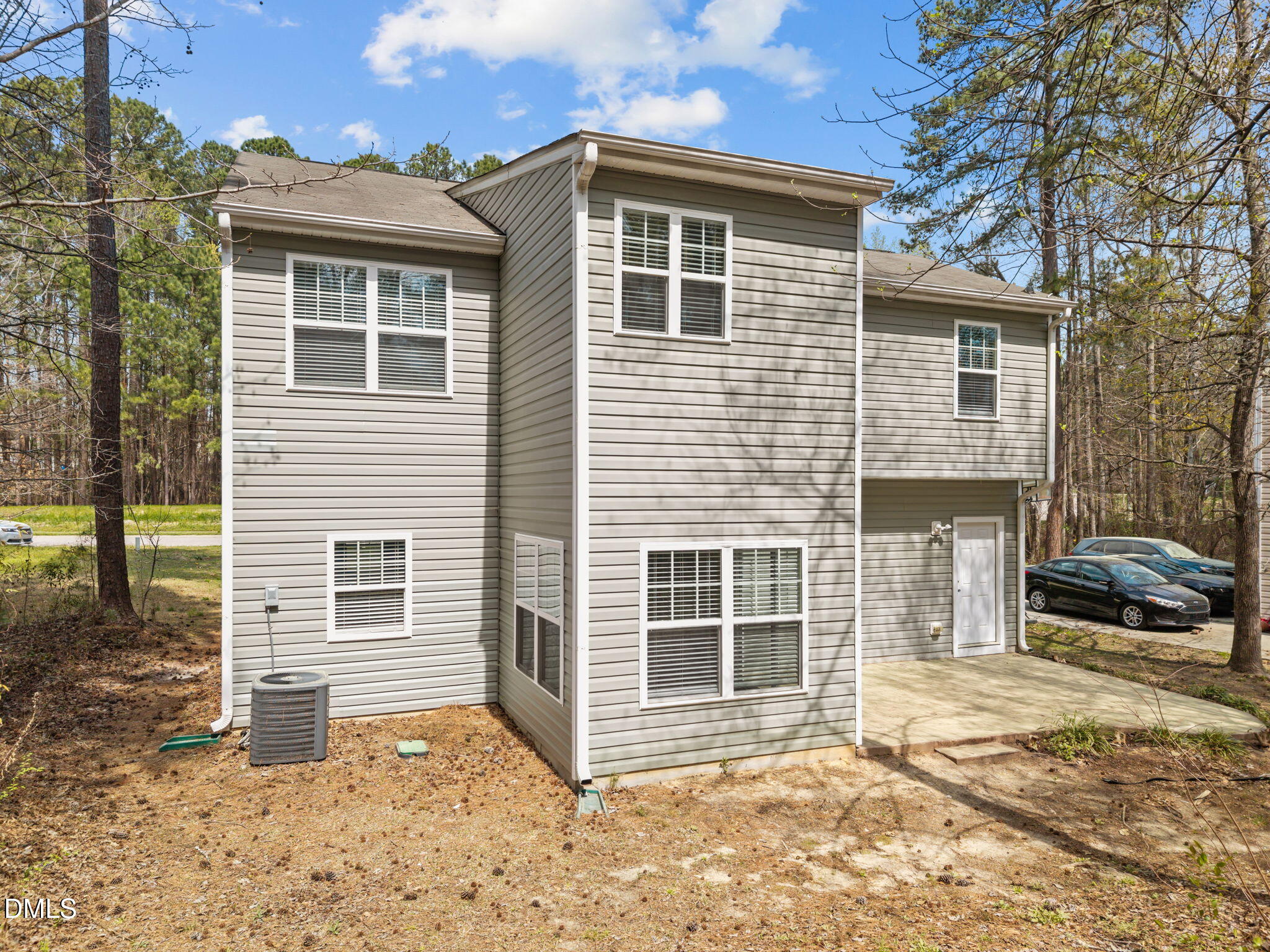 1071 Heritage Manor Drive Raleigh, NC 27610 - Photo 30 of 42 a front view of a house with a yard