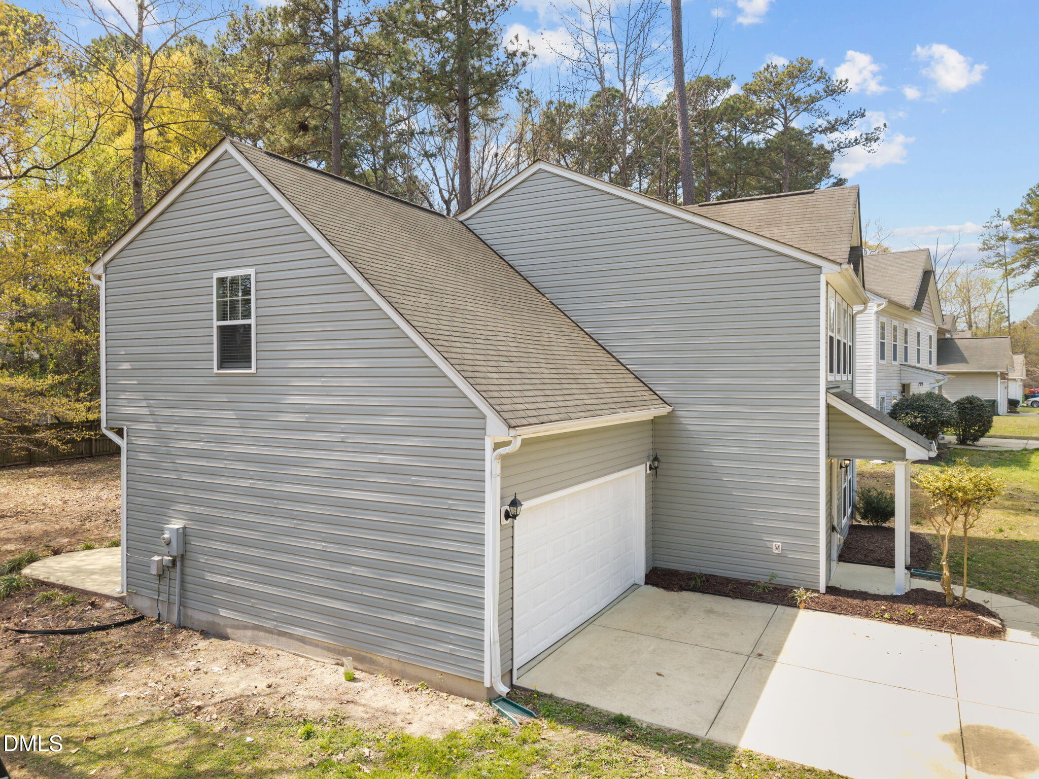 1071 Heritage Manor Drive Raleigh, NC 27610 - Photo 35 of 42 a view of a white house