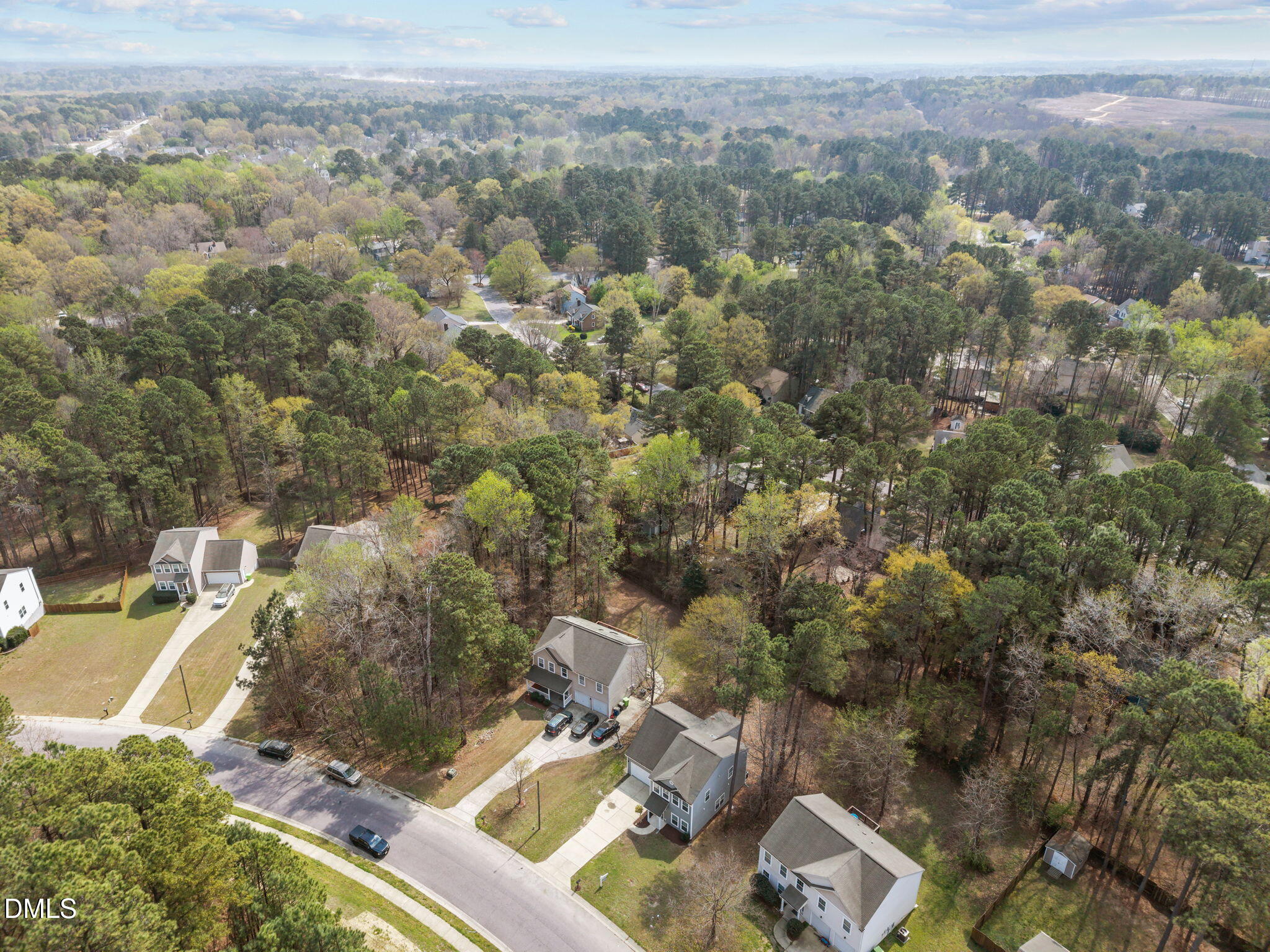 1071 Heritage Manor Drive Raleigh, NC 27610 - Photo 42 of 42 an aerial view of a house with a yard