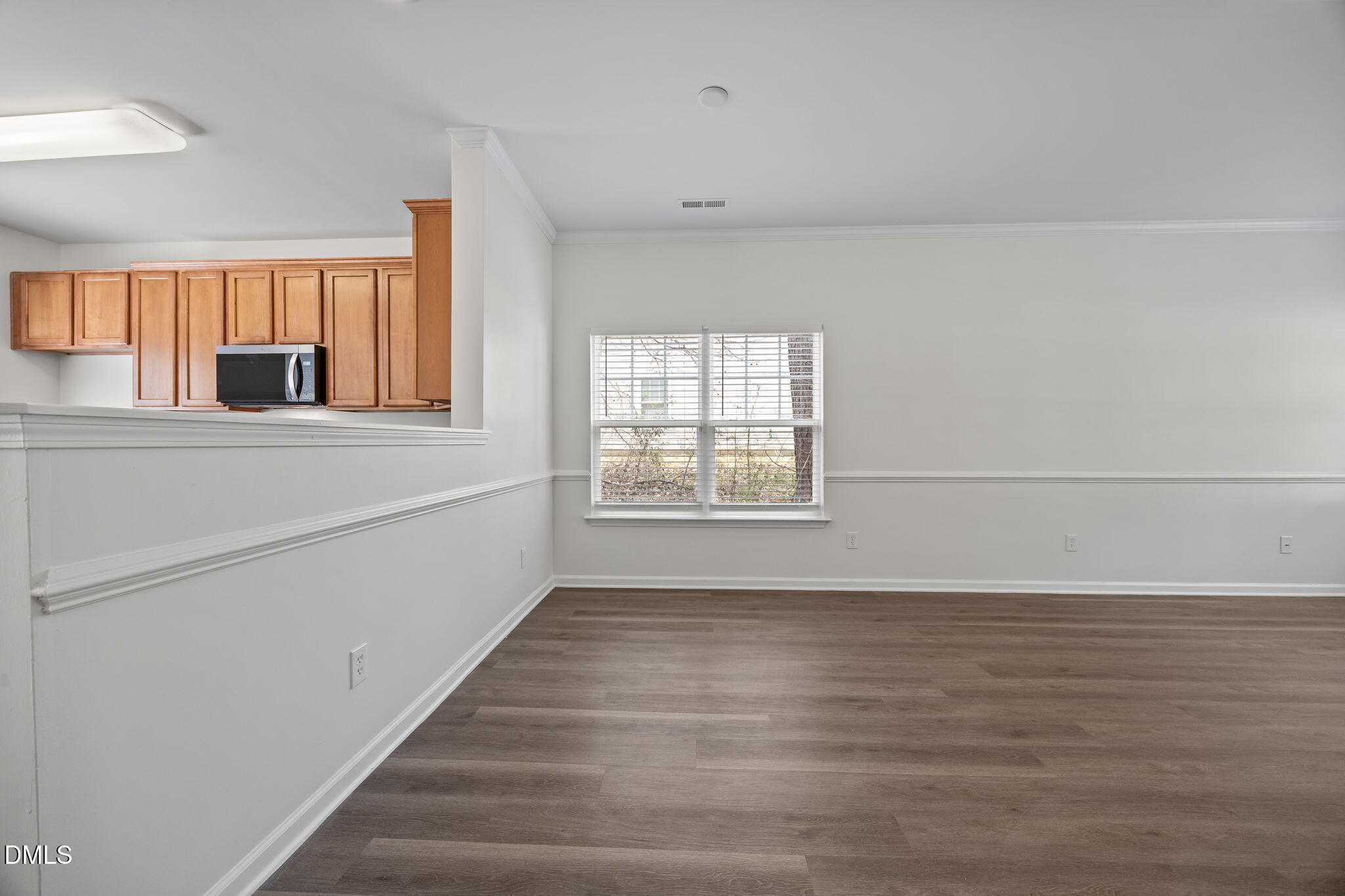 1071 Heritage Manor Drive Raleigh, NC 27610 - Photo 9 of 42 a view of an empty room with a window