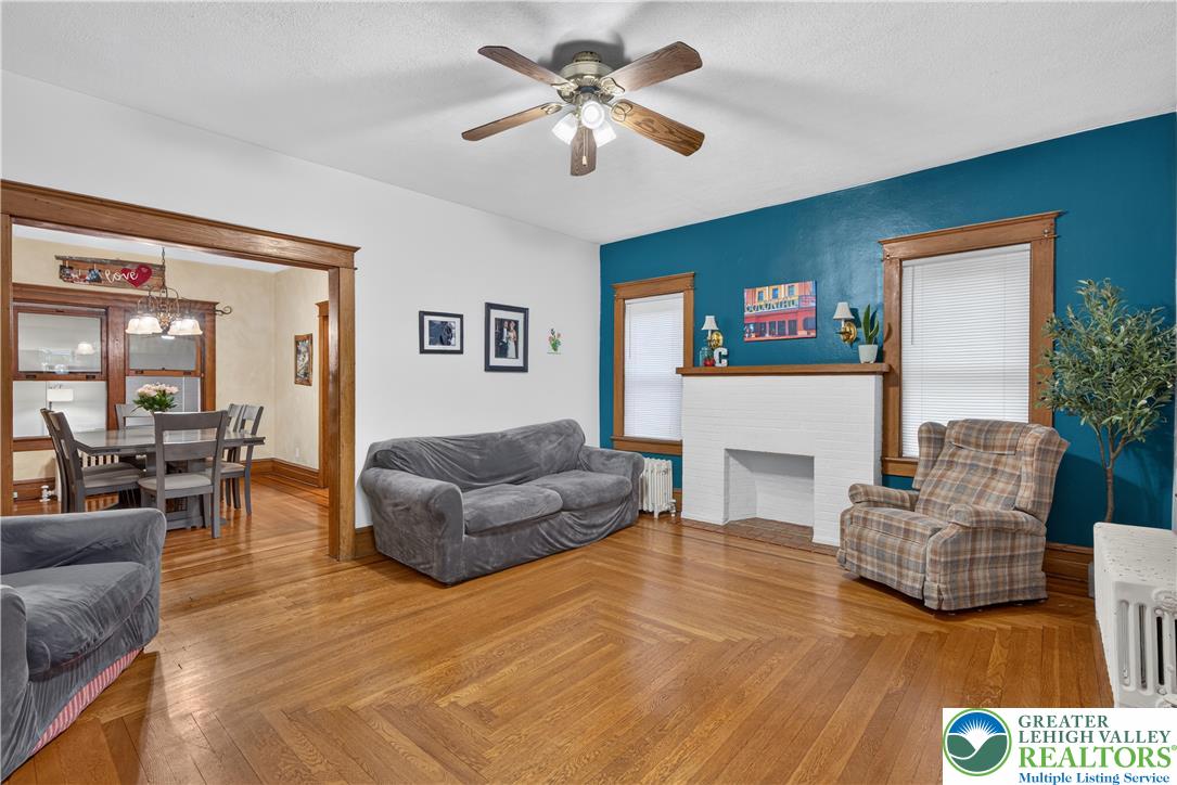 534 Ridge Street Emmaus, PA 18049 - Photo 5 of 40 a living room with furniture and a fireplace