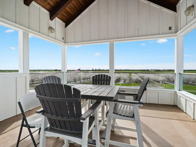 a view of parking garage with cars