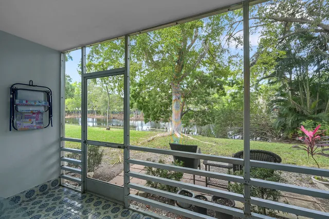 a view of a porch with a yard