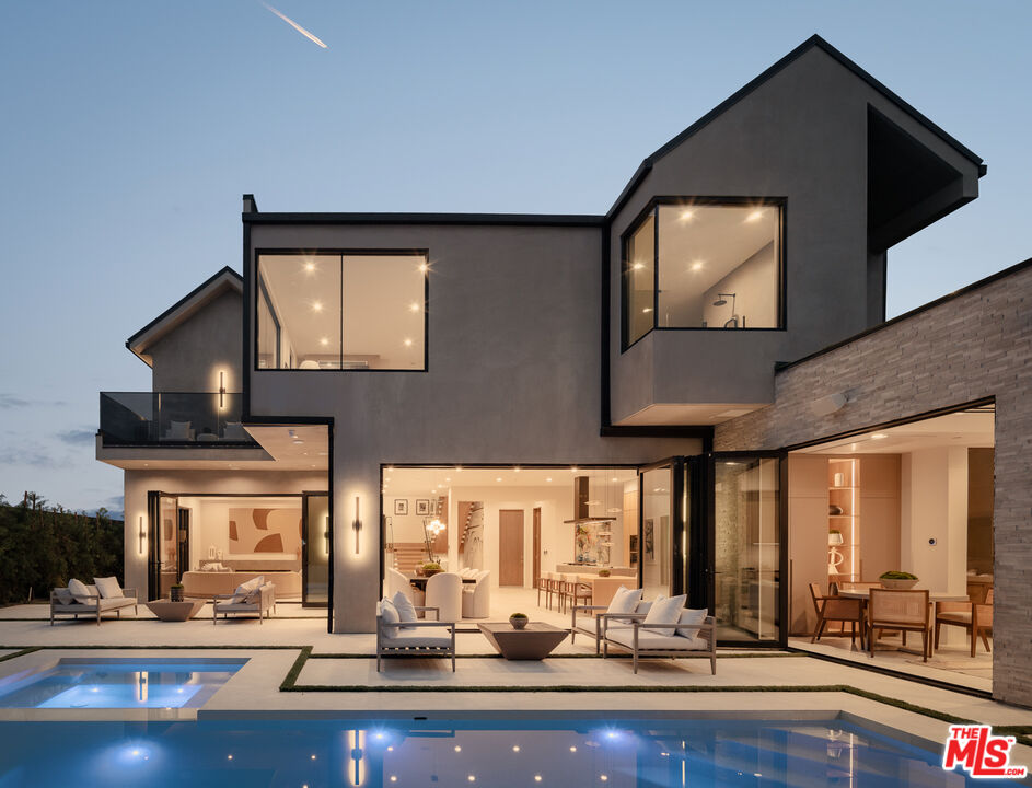 9919 Girla Way Los Angeles, CA 90064 - Photo 2 of 31 a room with lots of wooden floor and mirror