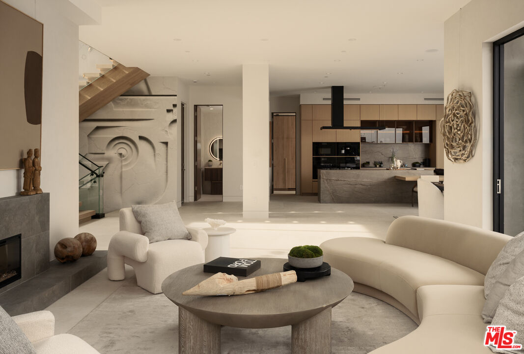 9919 Girla Way Los Angeles, CA 90064 - Photo 4 of 31 a living room with furniture and a fireplace