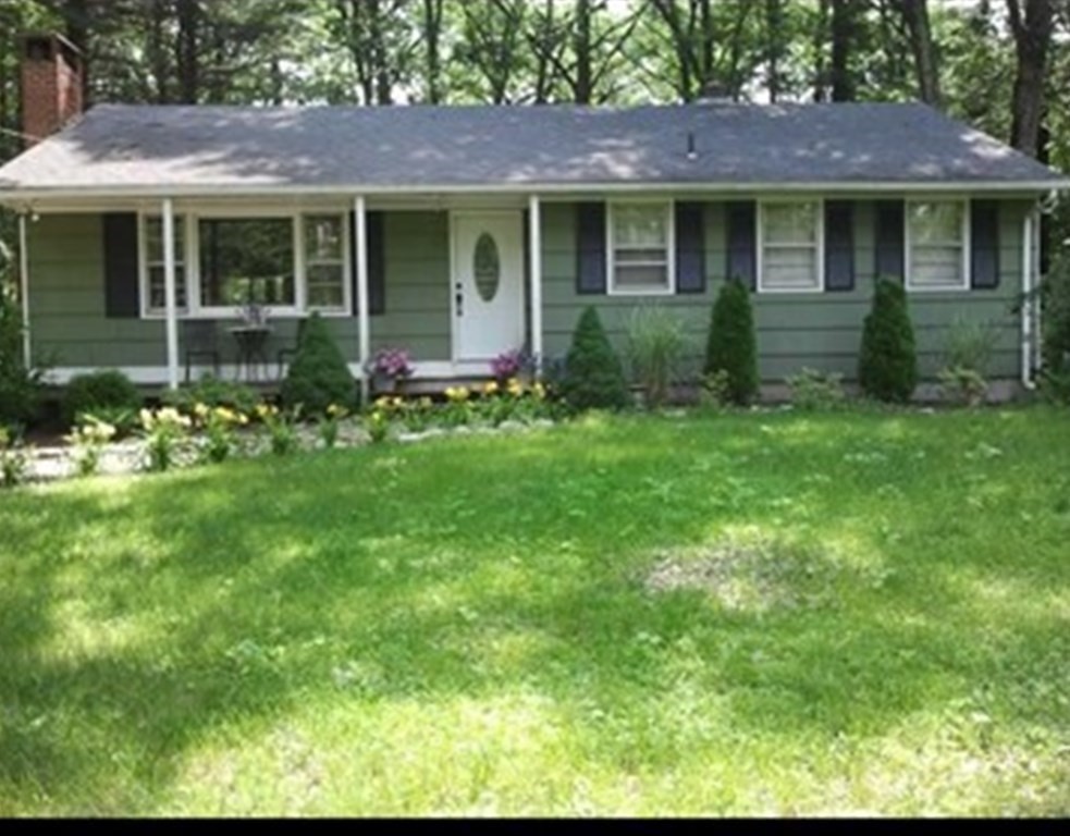 74 Walker Pond Road Sturbridge, MA 01566 - Photo 1 of 42 a view of a house with garden and yard