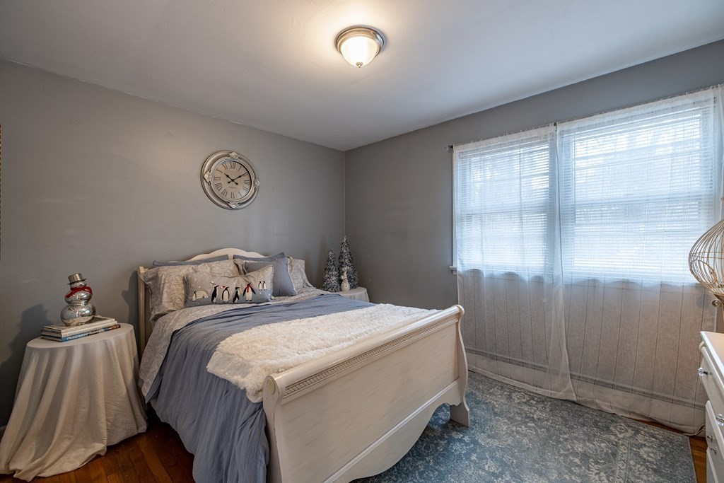 74 Walker Pond Road Sturbridge, MA 01566 - Photo 15 of 42 a bedroom with a bed and a window