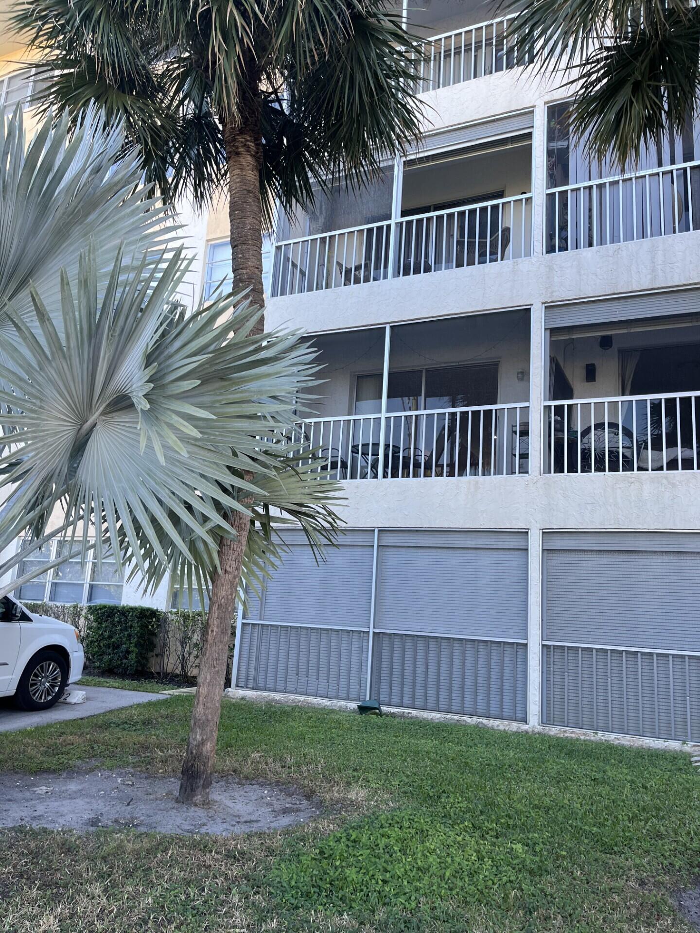 55 Southwest 2nd Avenue, Unit 2030 Boca Raton, FL 33432 - Photo 12 of 14 a view of a house with a yard