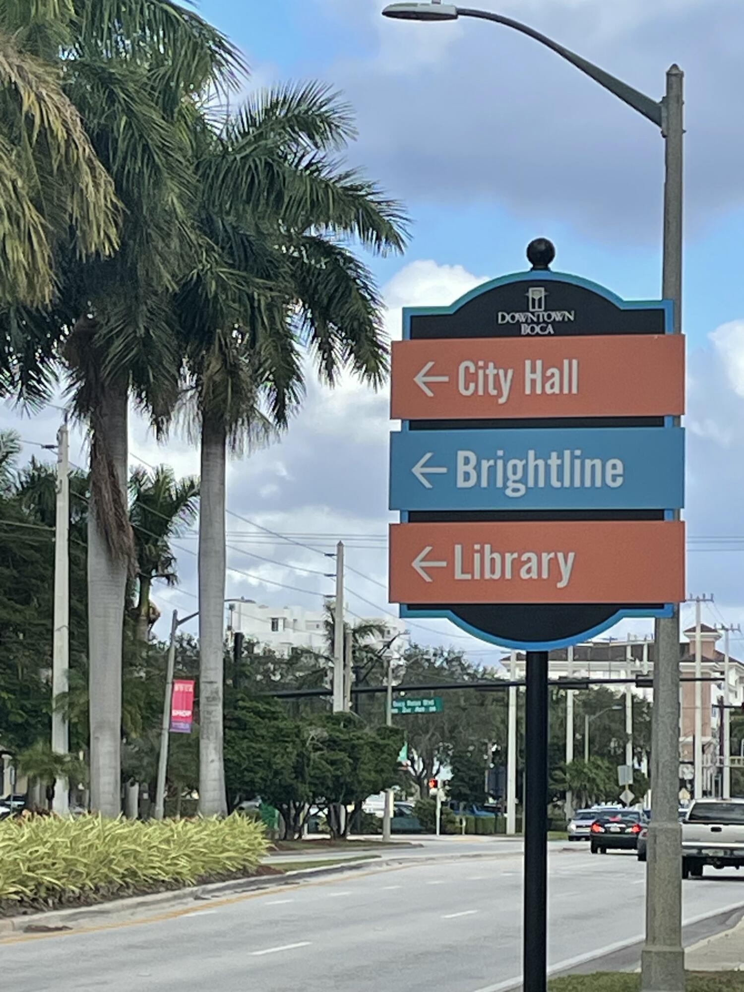 55 Southwest 2nd Avenue, Unit 2030 Boca Raton, FL 33432 - Photo 4 of 14 a street sign on a pole on a street