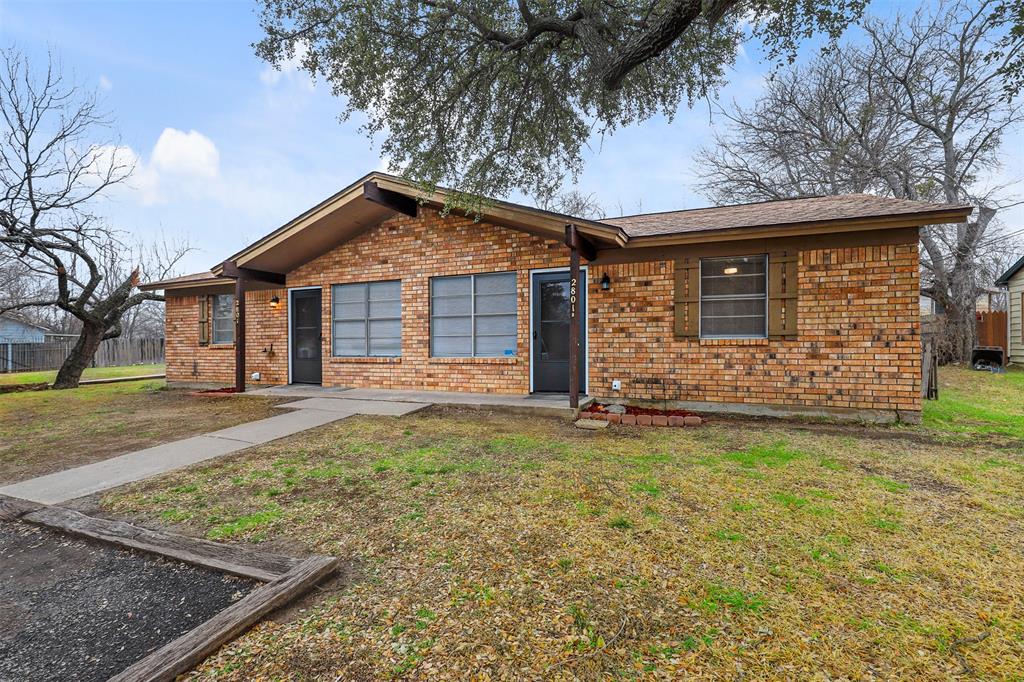 2801 Skyline Drive, Unit A Sansom Park, TX 76114 - Photo 1 of 16 front view of a house with a yard
