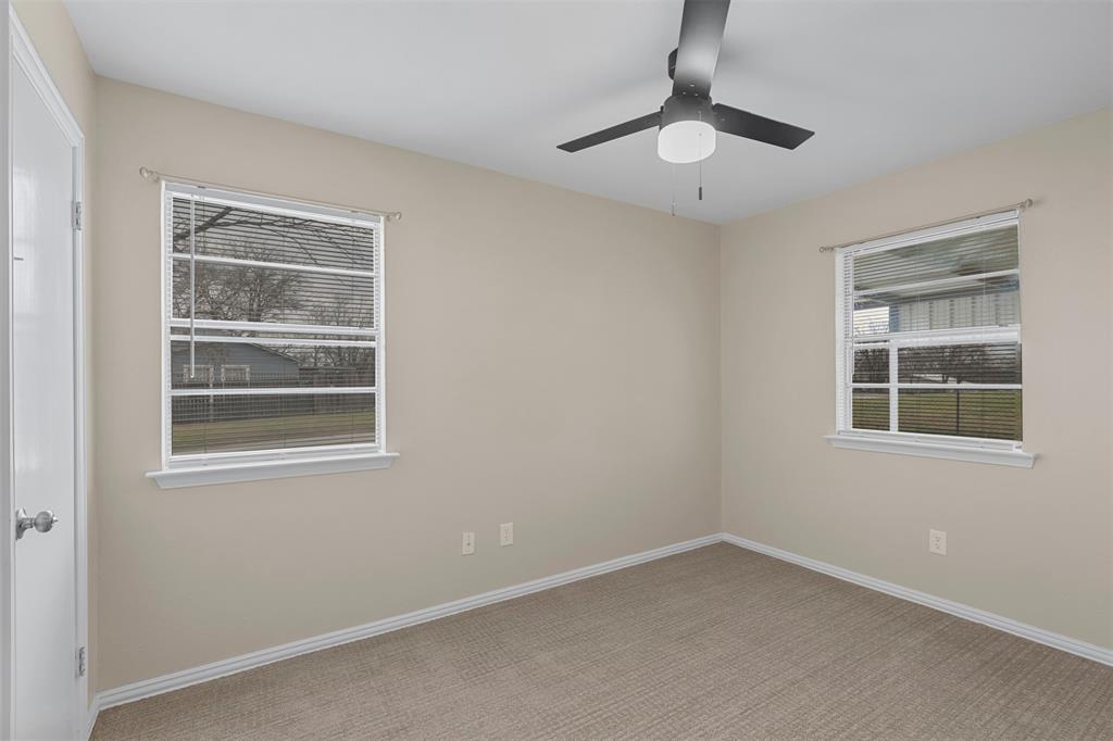 2801 Skyline Drive, Unit A Sansom Park, TX 76114 - Photo 13 of 16 an empty room with a window