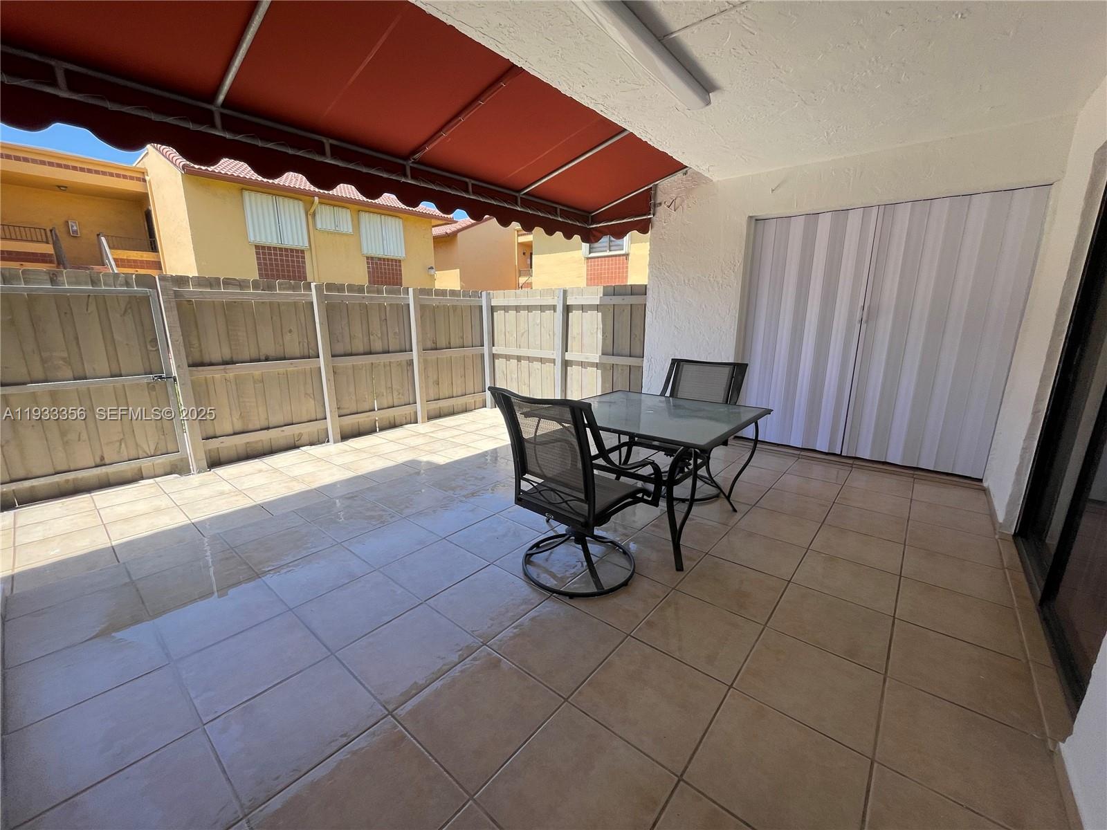 10897 Northwest 7th Street, Unit 1429 Miami, FL 33172 - Photo 13 of 17 a view of a room with furniture and next to a window