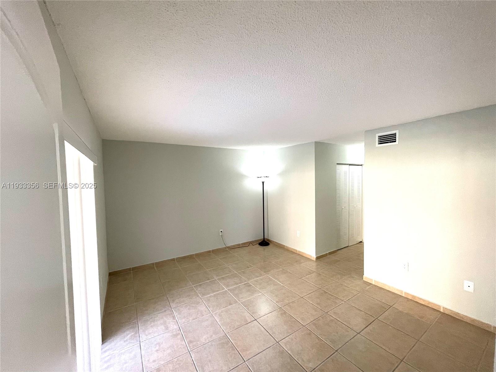 10897 Northwest 7th Street, Unit 1429 Miami, FL 33172 - Photo 5 of 17 a view of empty room