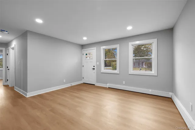 an empty room with windows