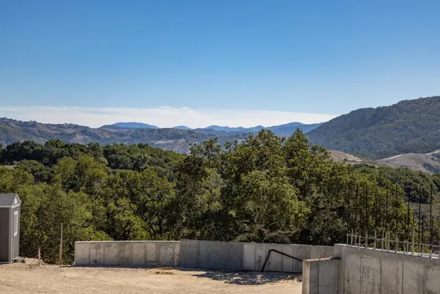 a view of a outdoor space with mountain view