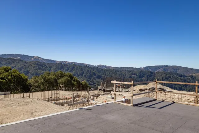a view of a street with a mountain view
