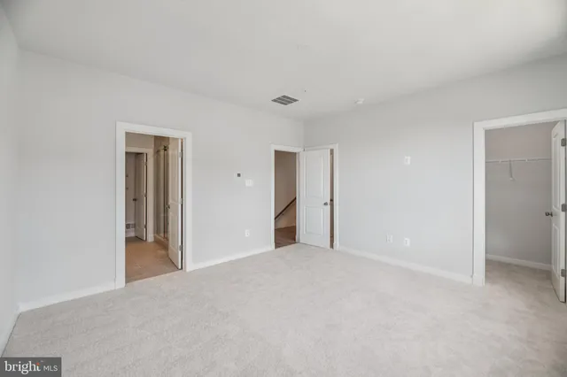 a bathroom with a sink double vanity and a mirror